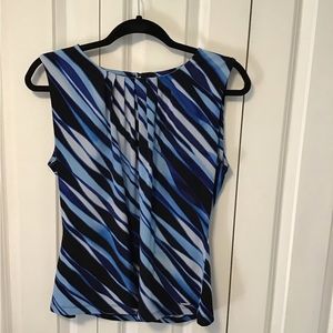 Flattering shades of blue with black sleeveless top